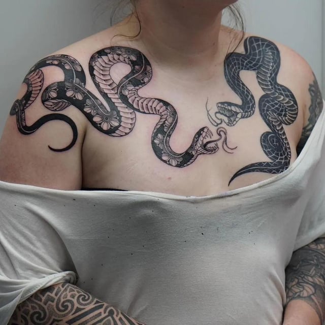 snake chest tattoo