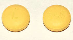 yellow round pill with l