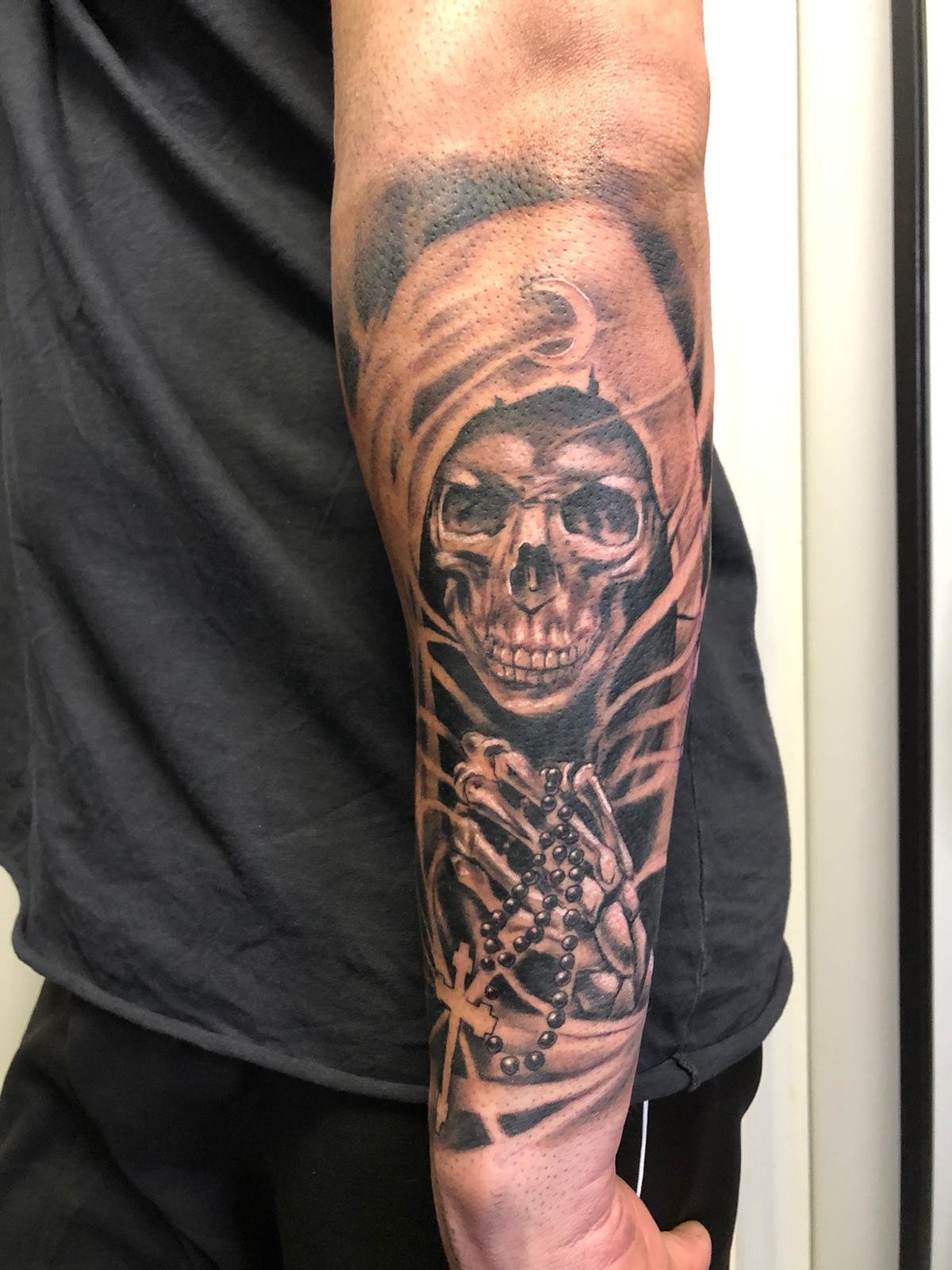 santa muerte tatuajes en el brazo