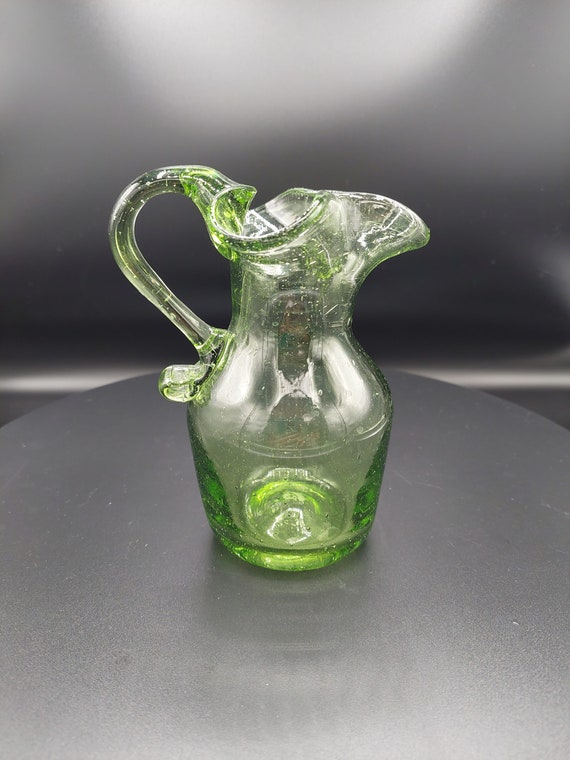 hand blown green glass pitcher