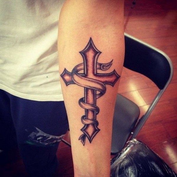 forearm cross tattoo