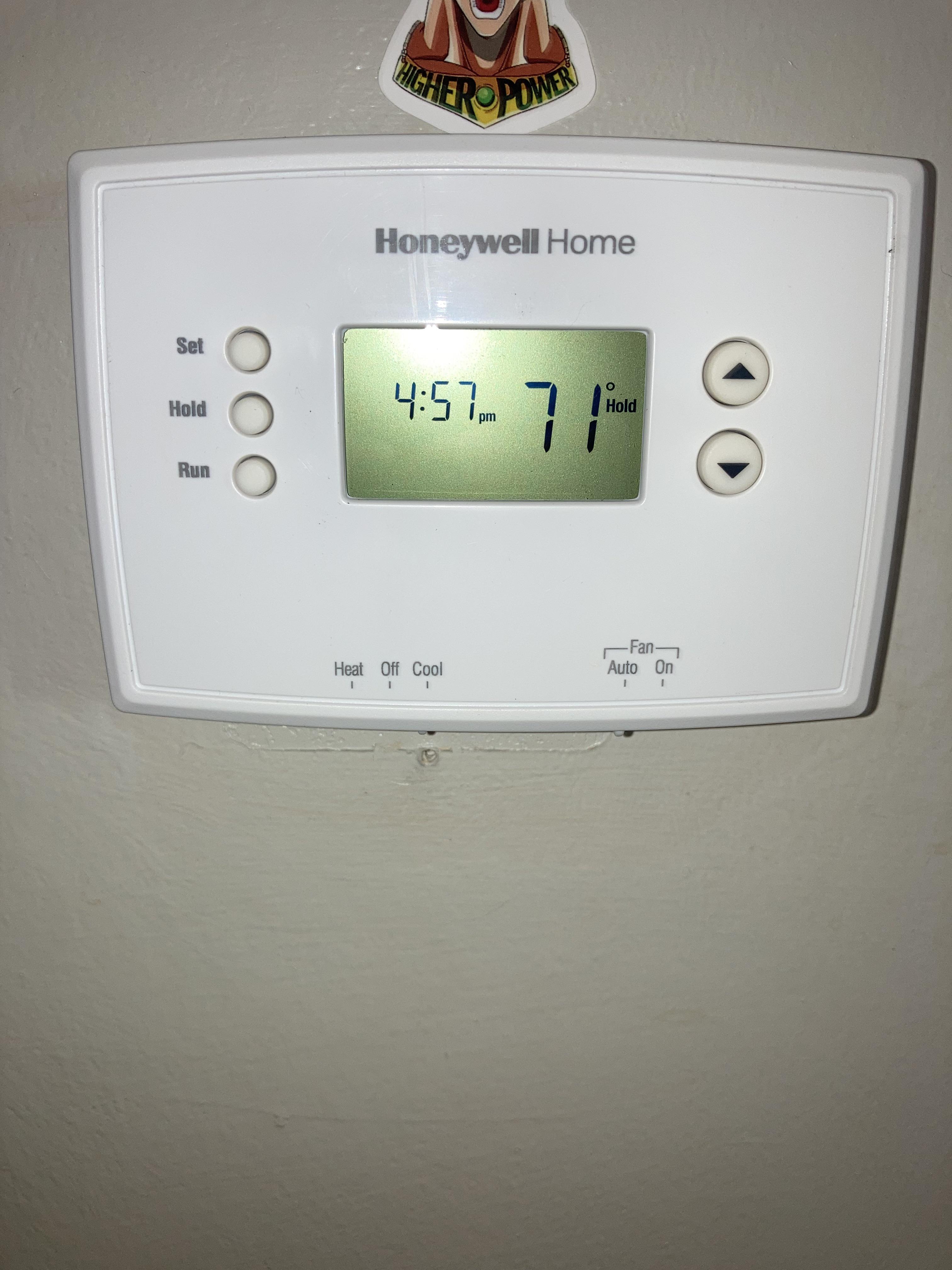 removing honeywell thermostat cover