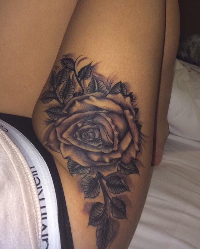 tattoo of roses on thigh