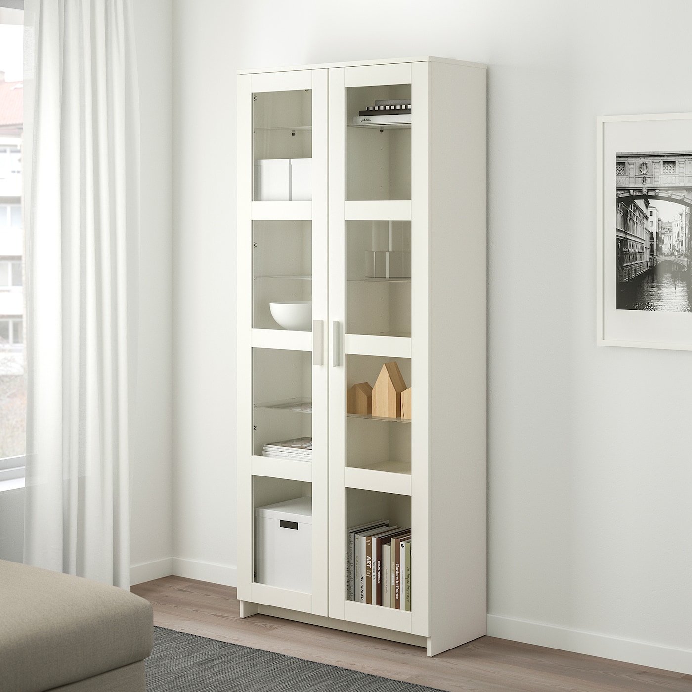 white cabinet with glass doors