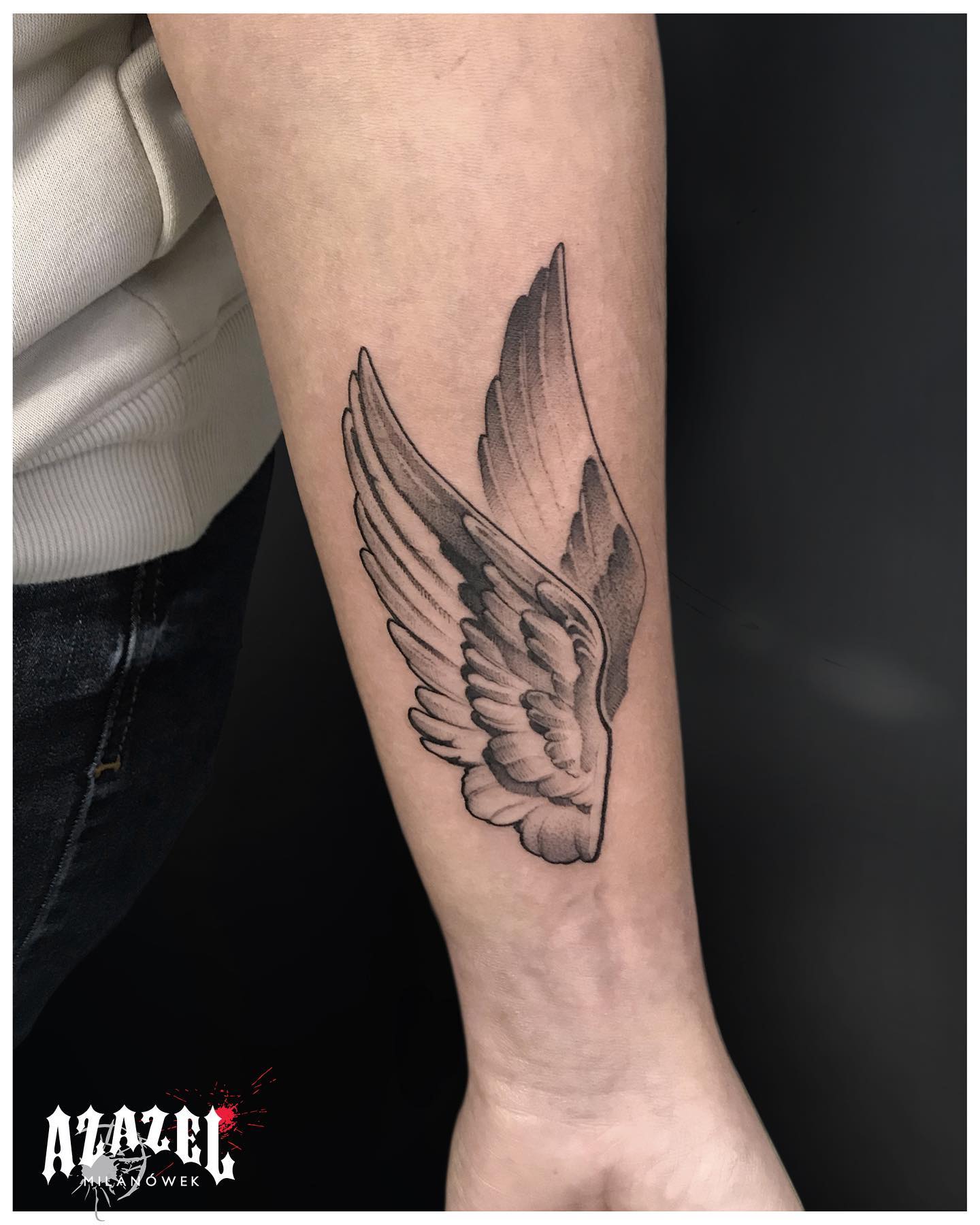 tattoo wings on arms