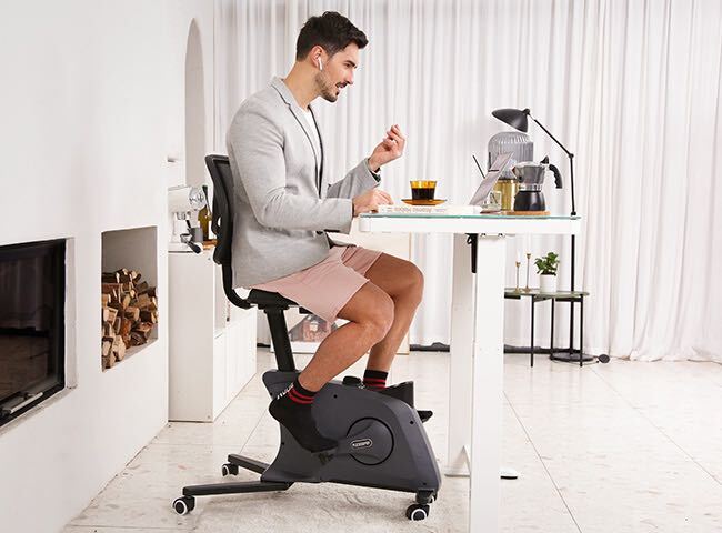 stationary bicycle under desk