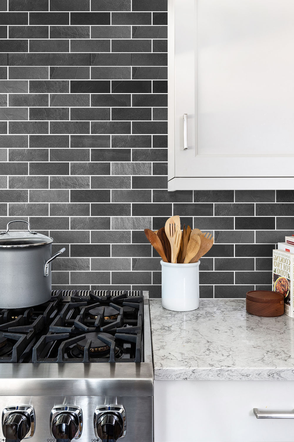 black subway tile backsplash