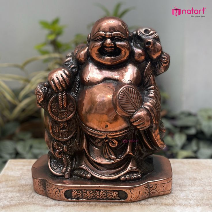 laughing buddha with money bag