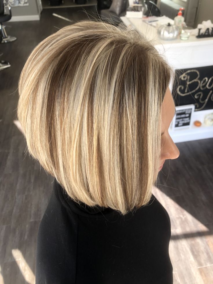 bob cut with blonde highlights