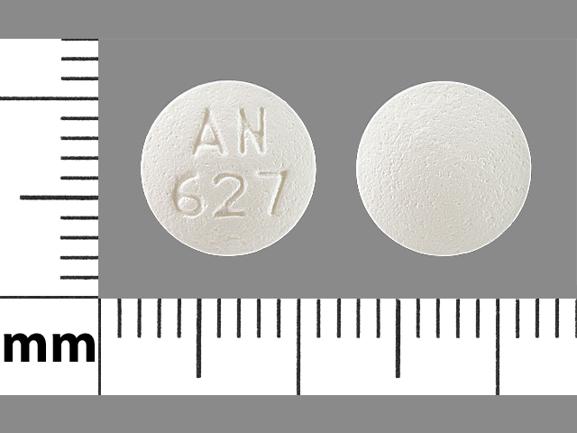 an 527 white round pill tramadol