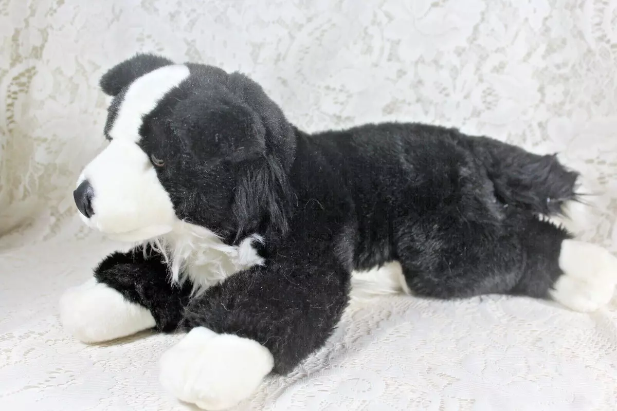 black and white dog stuffed animal