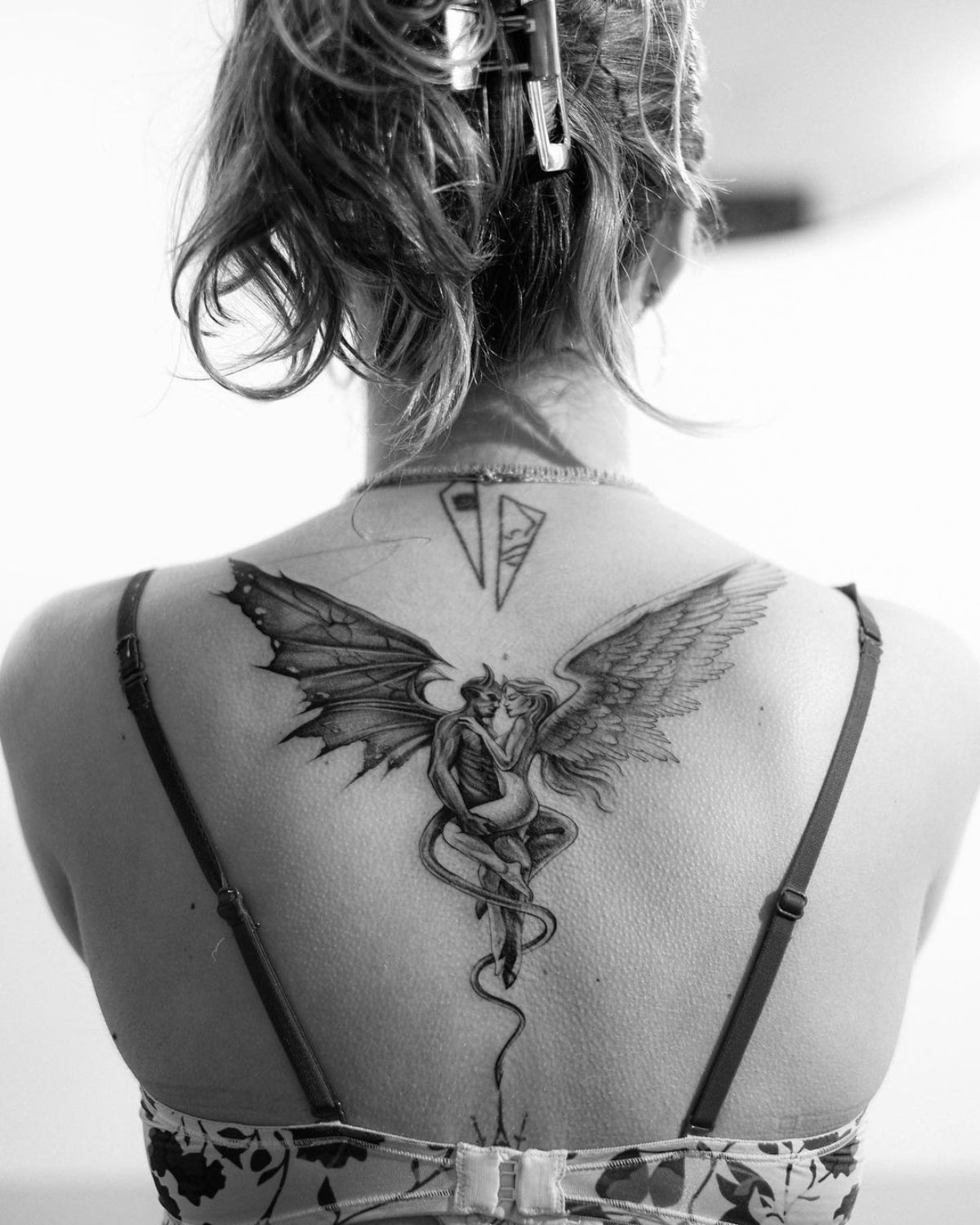 angel or devil tattoo