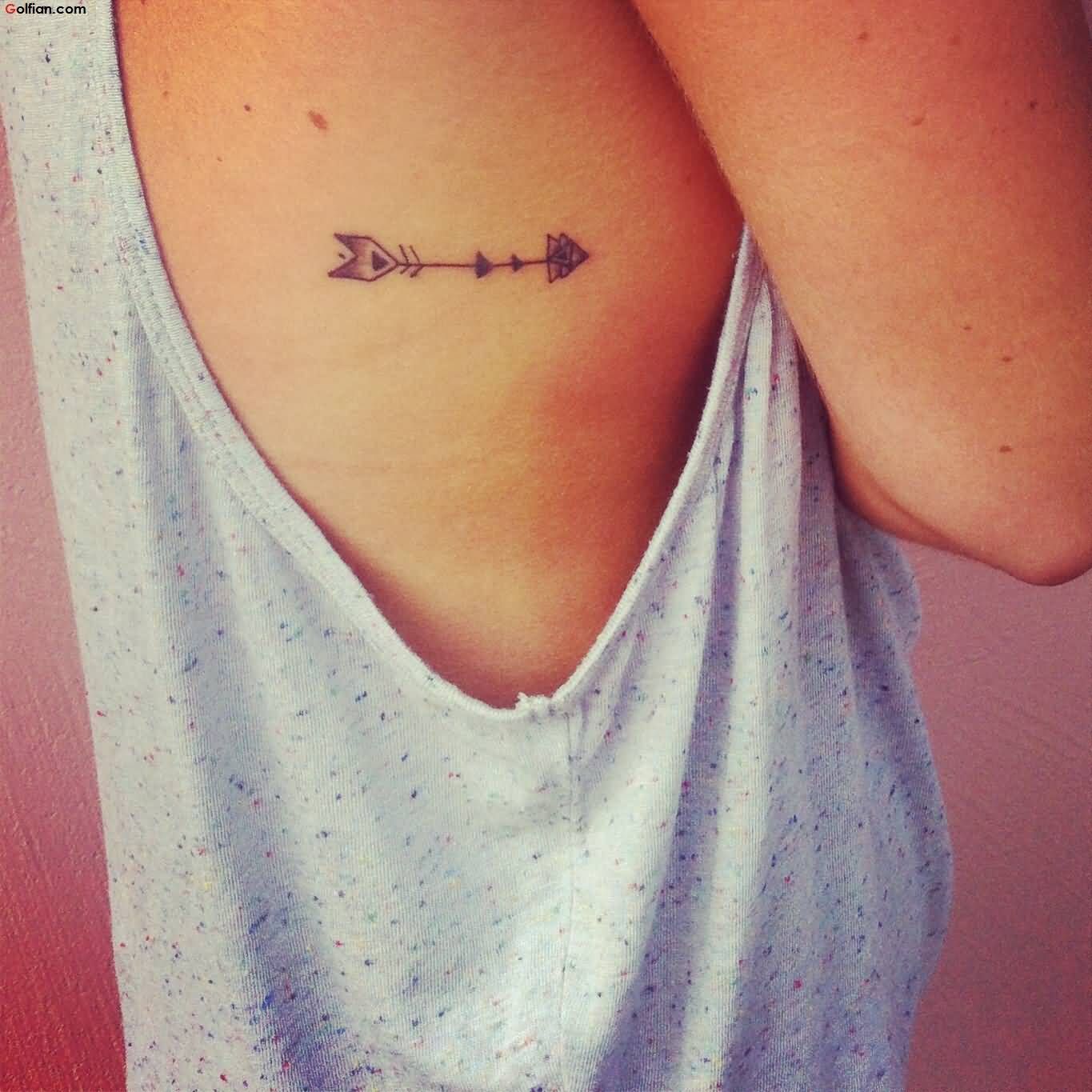 arrow rib tattoo