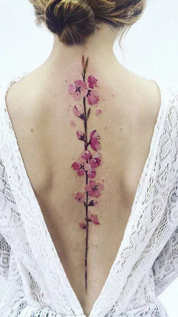 back feminine cherry blossom tattoo