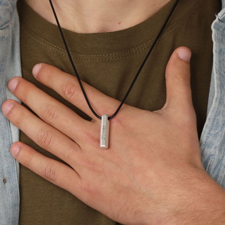 black cord necklace with pendant