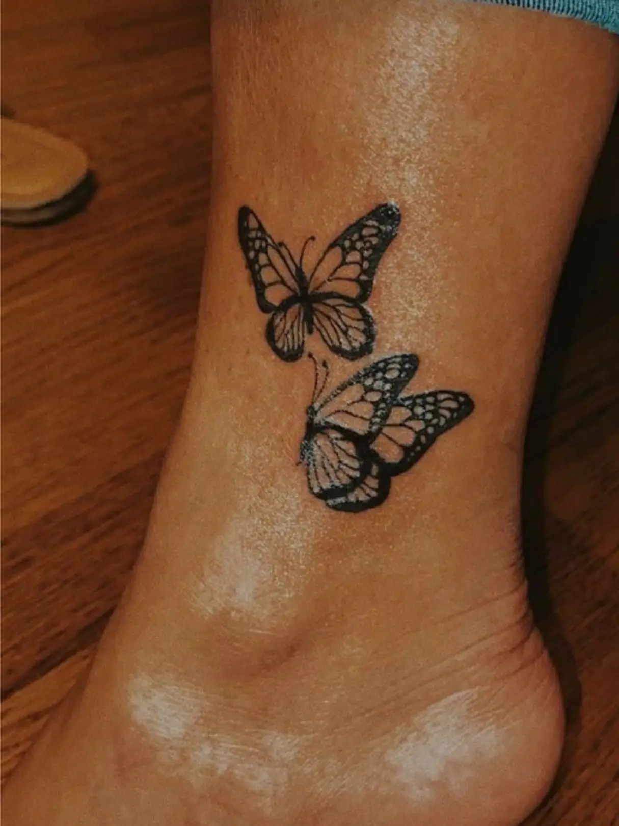 butterfly tattoo on ankle