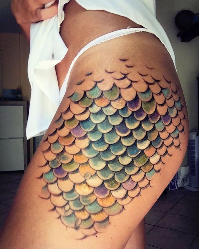 cuisse tattoo