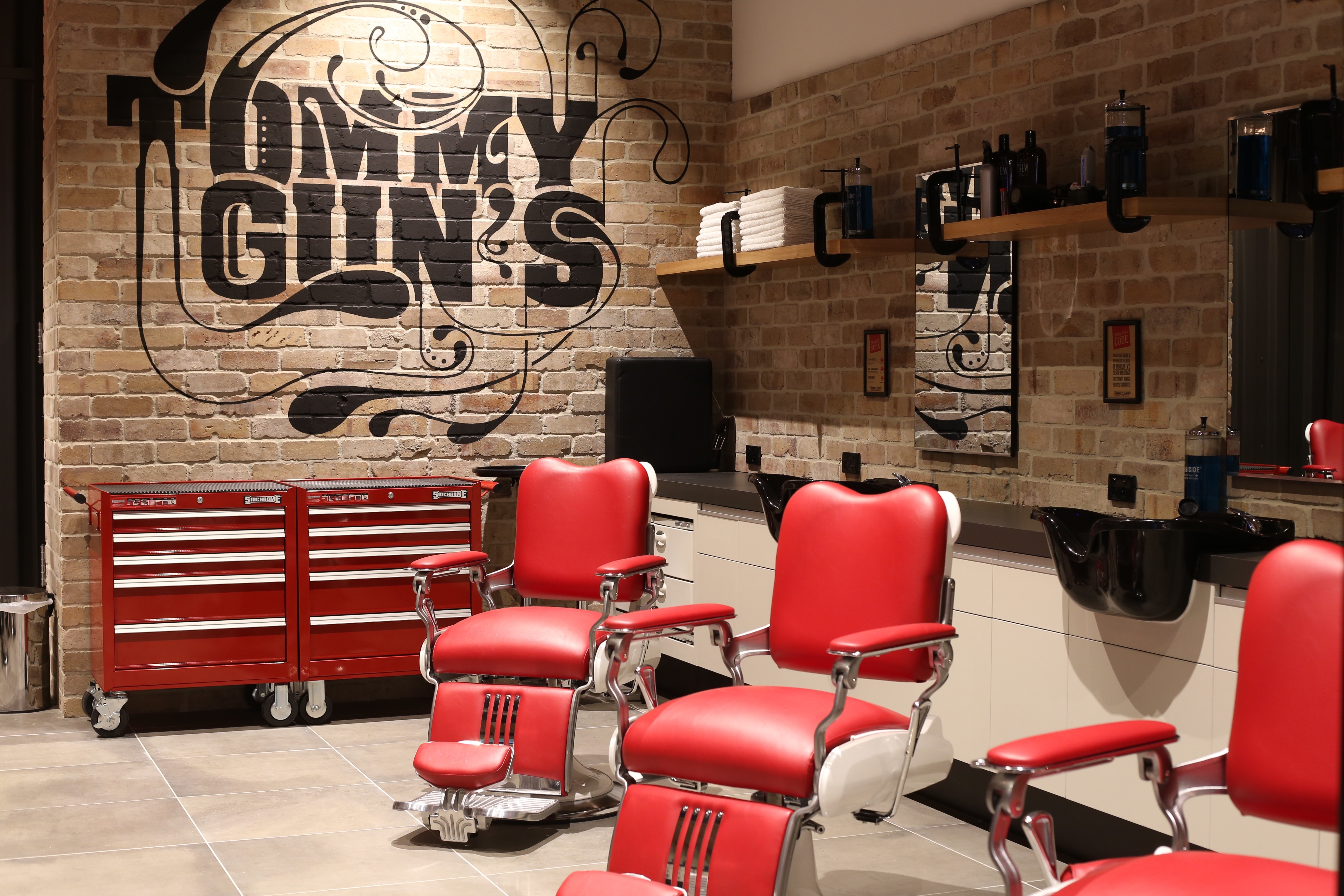 tommy guns sunshine plaza barbershop