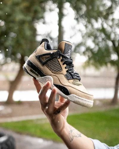 brown air jordan 4s