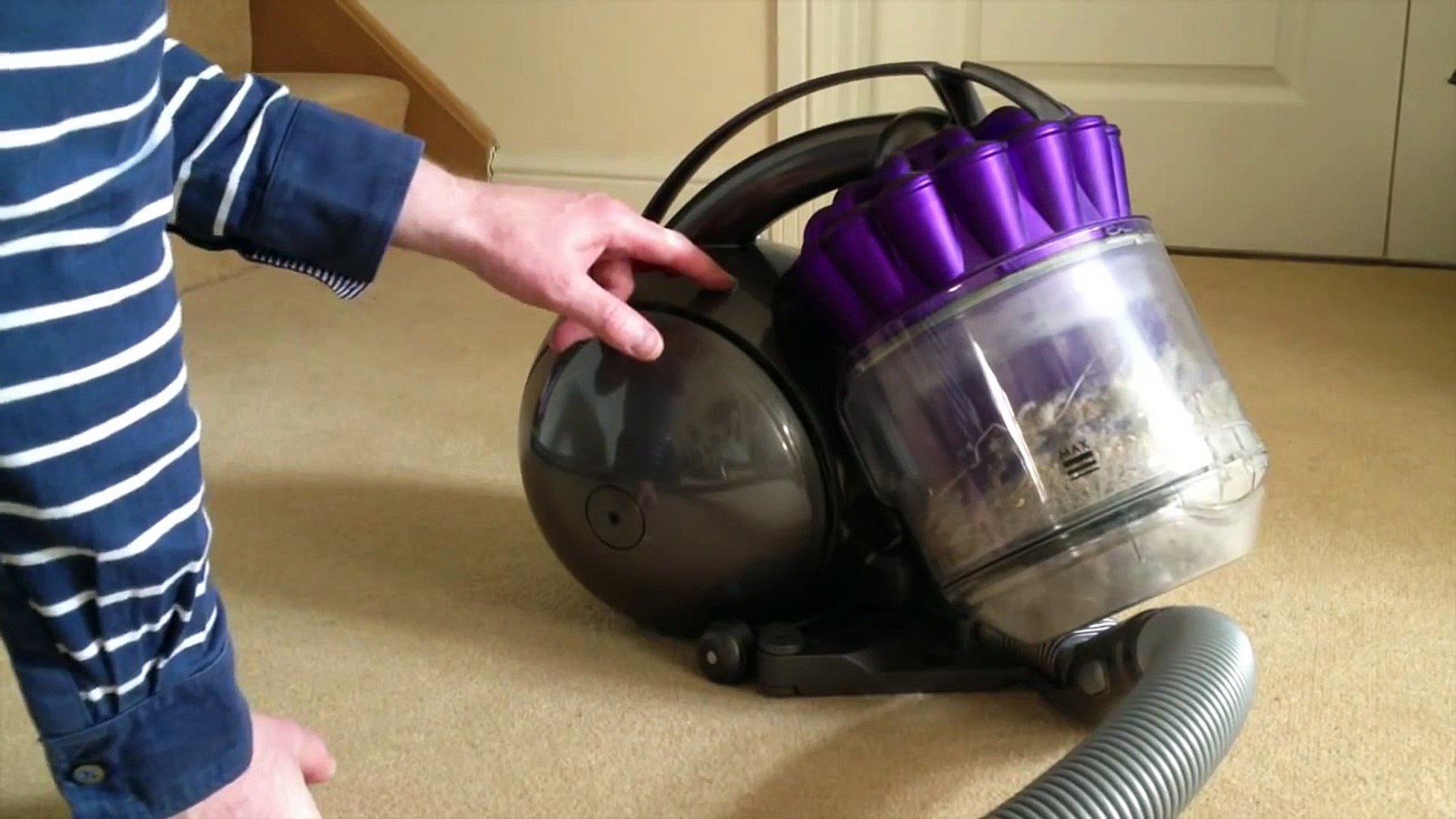 how do you open a dyson vacuum