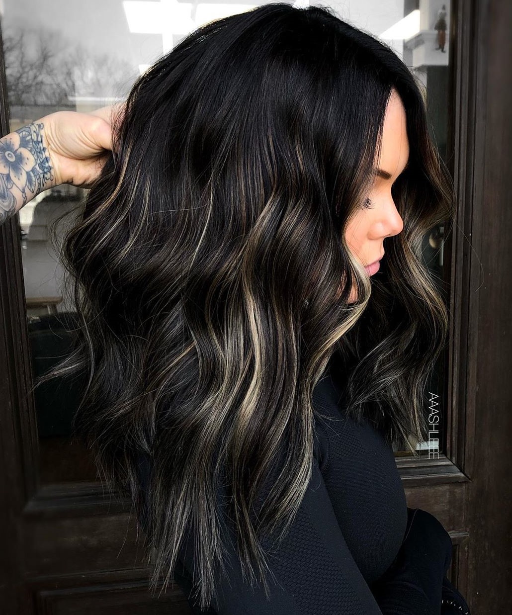 shoulder length black hair with highlights