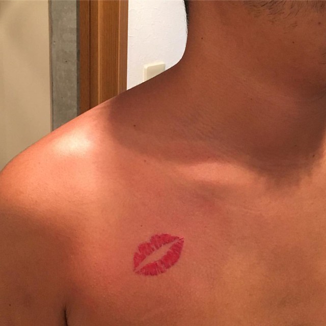 kiss mark tattoo