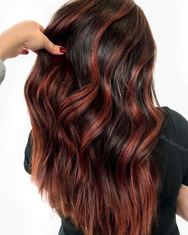 red and brown highlights in brown hair