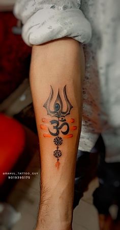 shiva tattoo on wrist